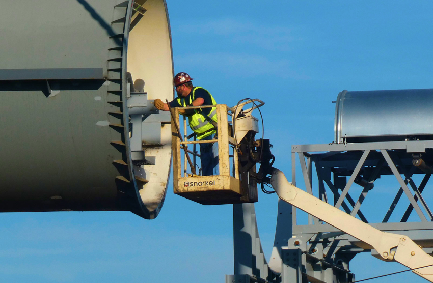 Worker in bucket truck