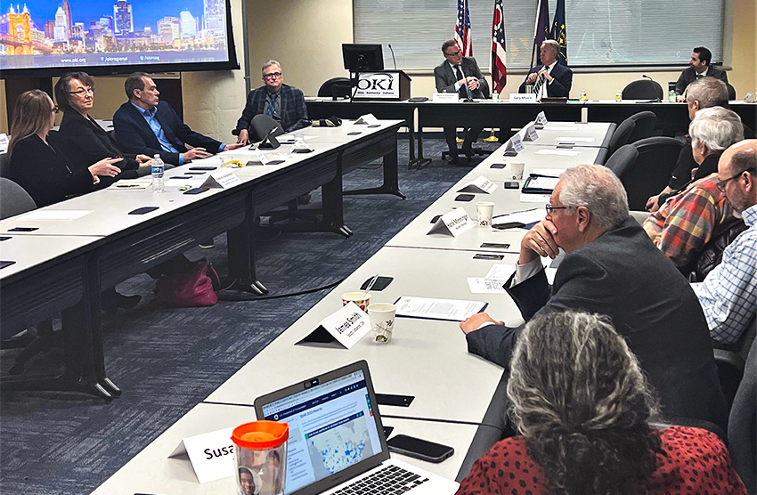 Group of board members looking towards front