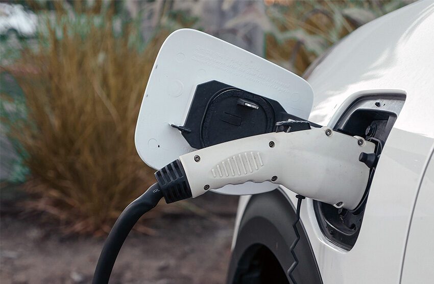 Electric Vehicle plugged into a charger