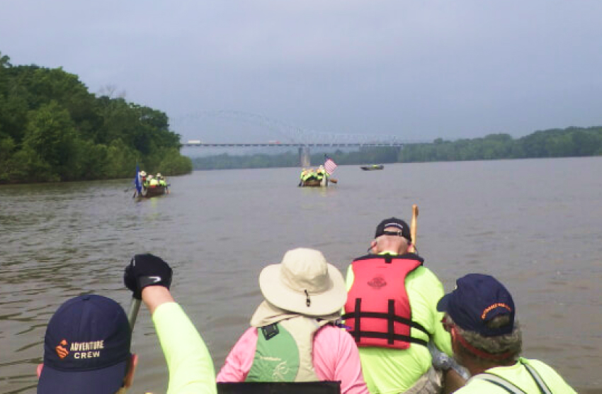 A group of people on a boat on the Ohio River